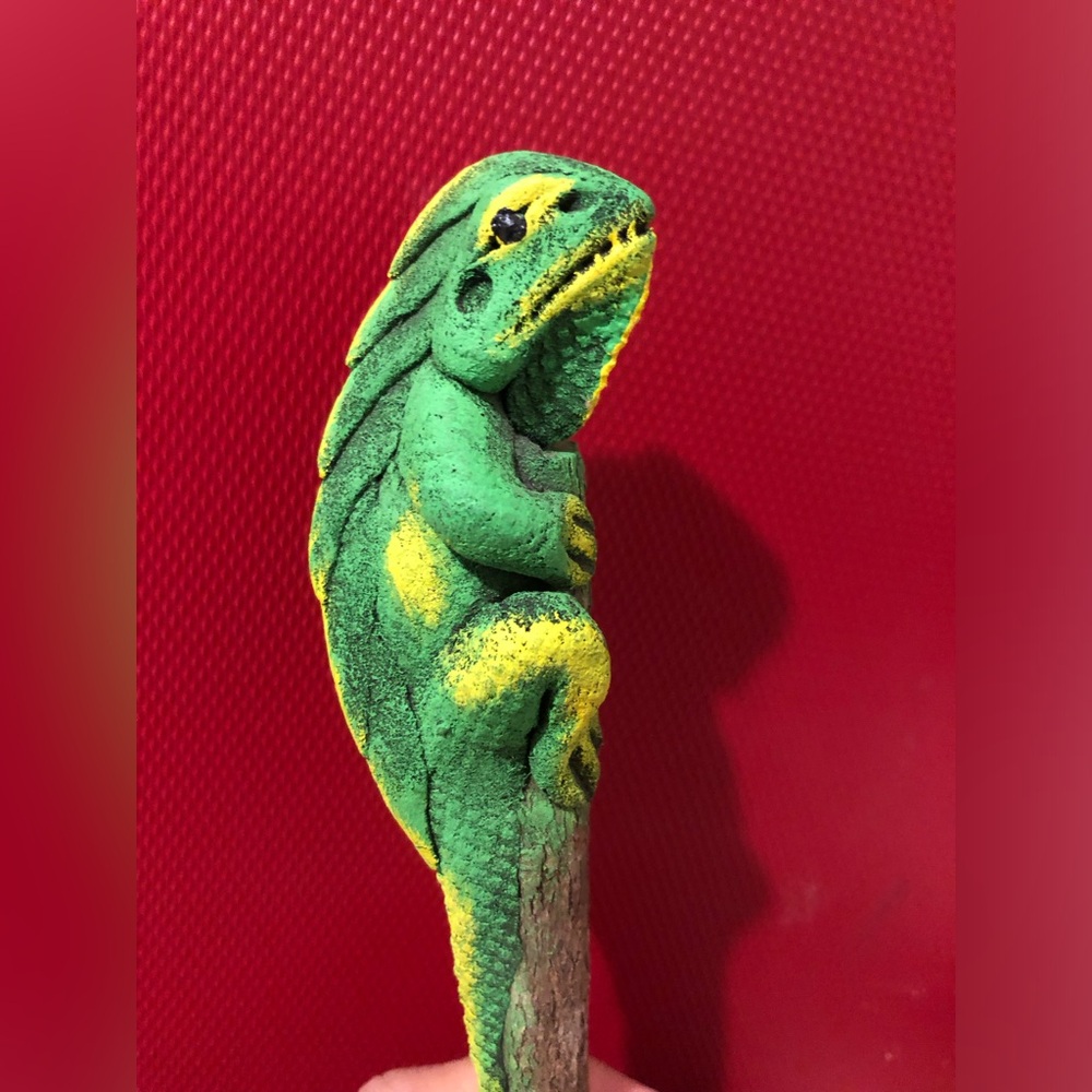 Carved wooden iguana pencil